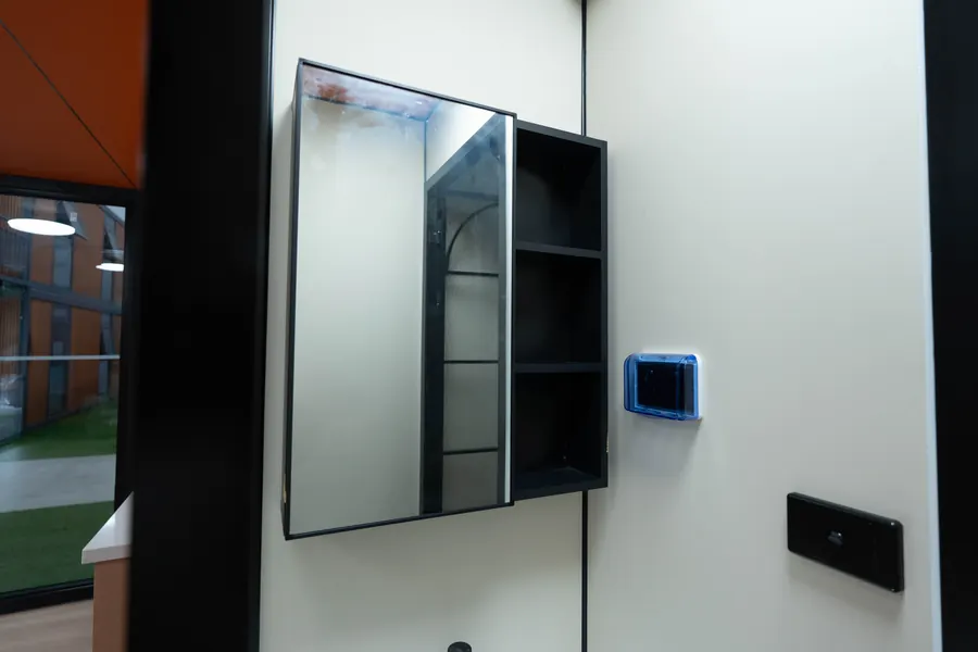 Bathroom mirror and wall controls