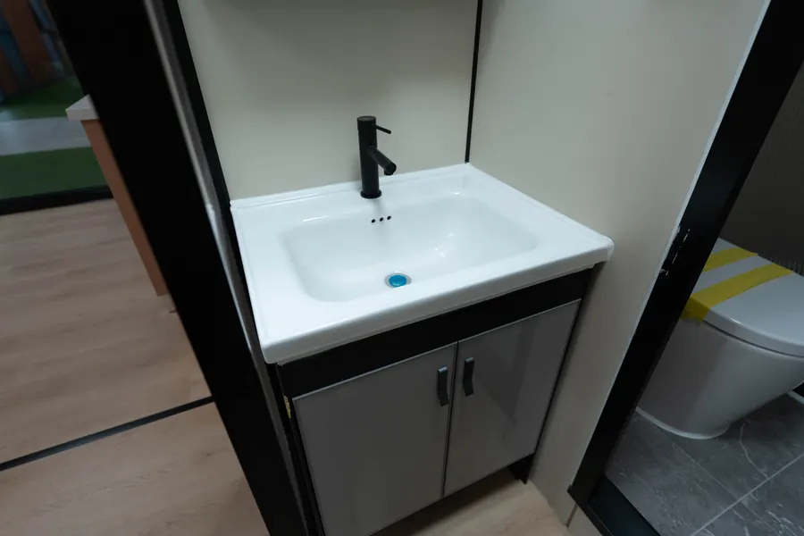 Compact bathroom vanity and cabinet