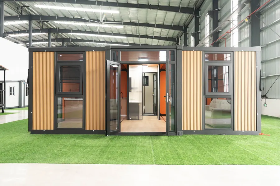 Front elevation of the 20 ft wood-finish expandable house with glazed entrance