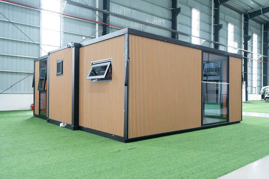Rear corner of the wood-finish 20 ft expandable house