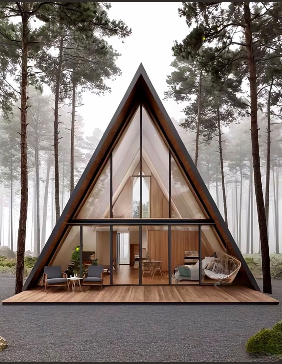 Simple panoramic A-frame cabin in a forest