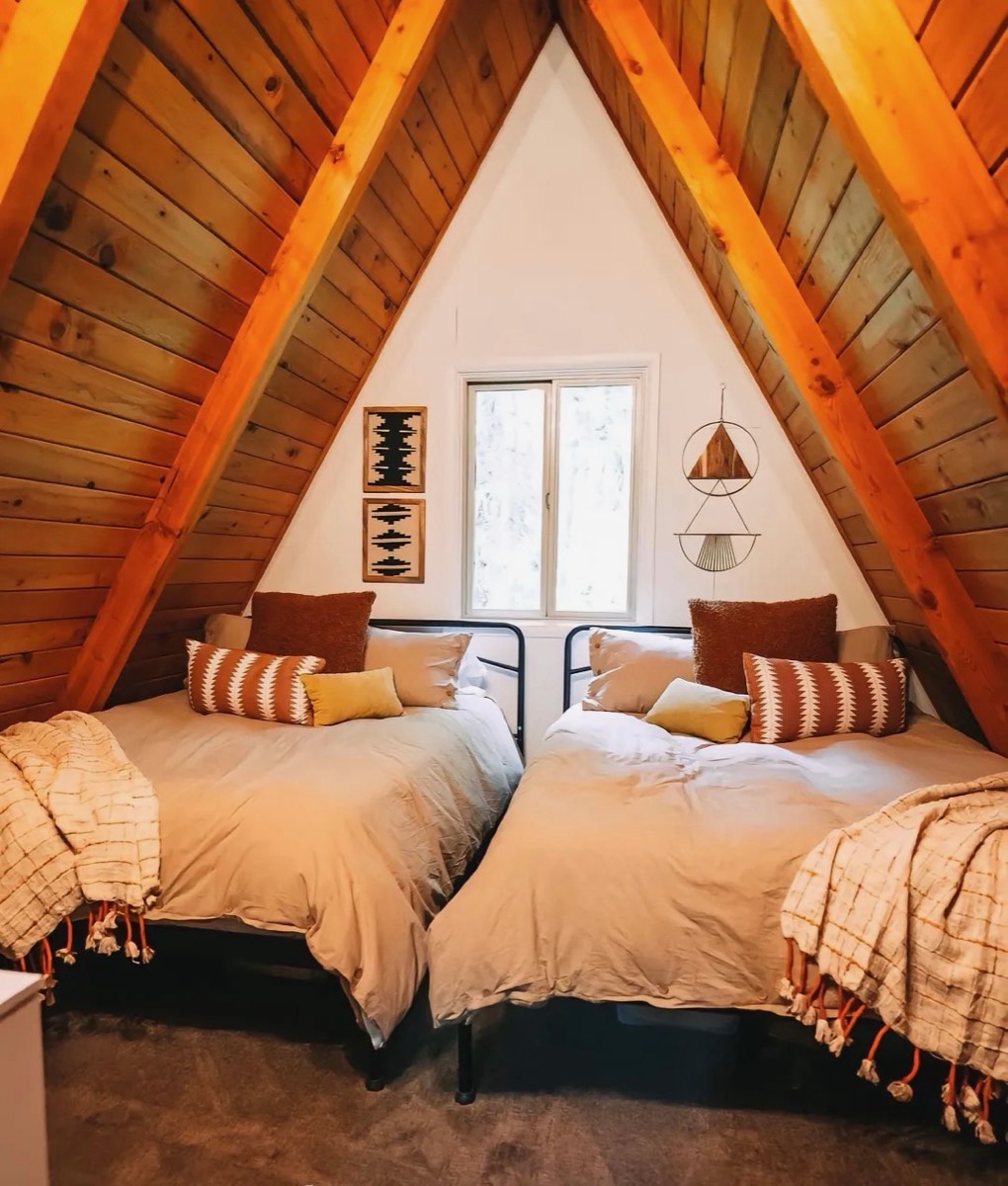 Twin bedroom in an A-frame sleeping loft