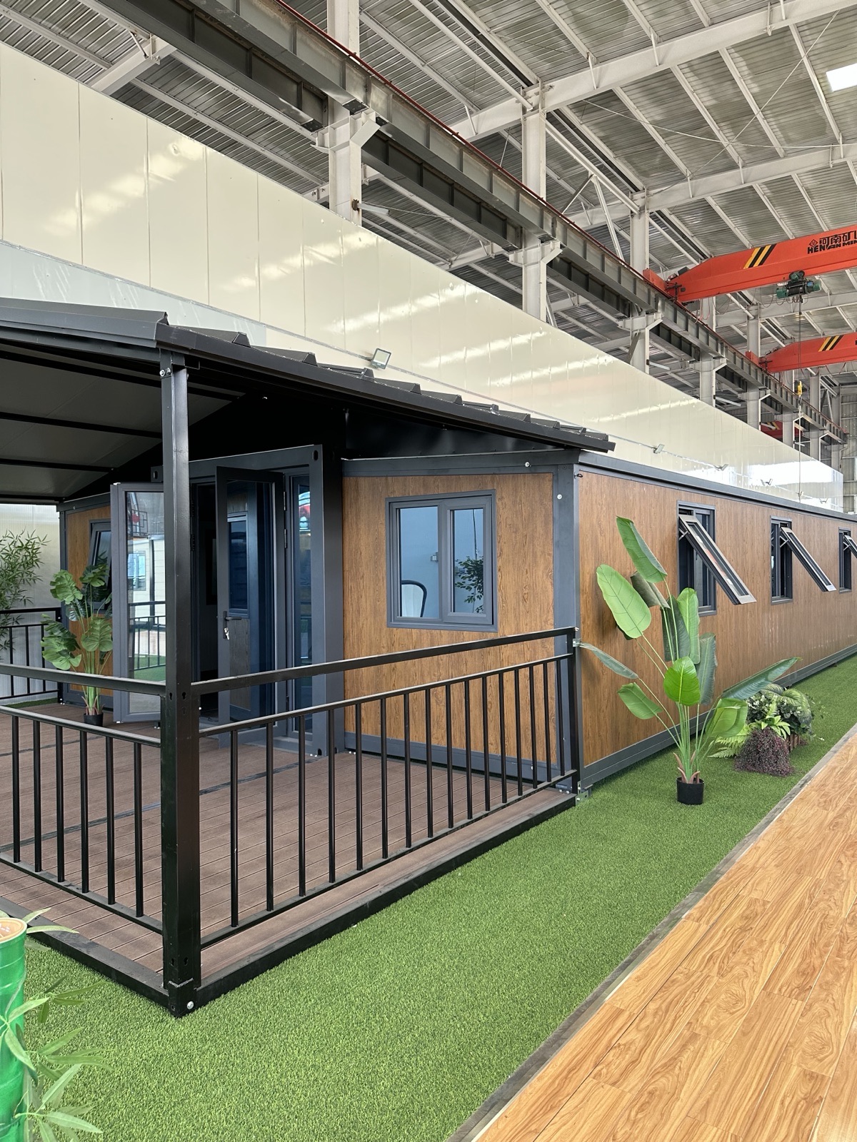 Expandable house with a covered residential deck