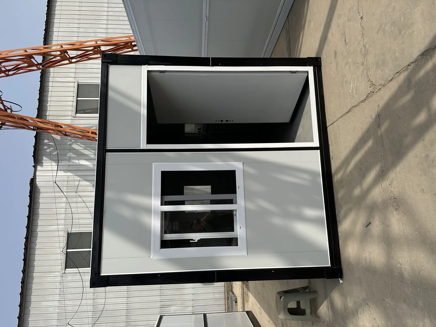 Front view of a compact factory-built relief housing module
