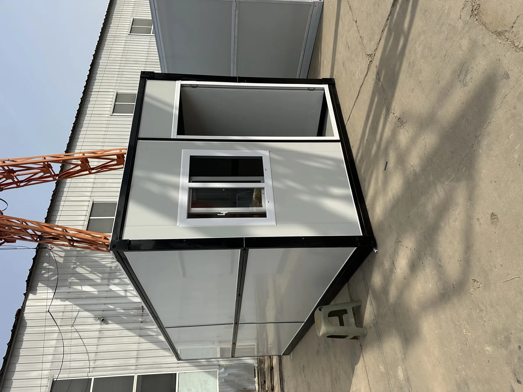 Expandable prefabricated shelter module viewed at the factory