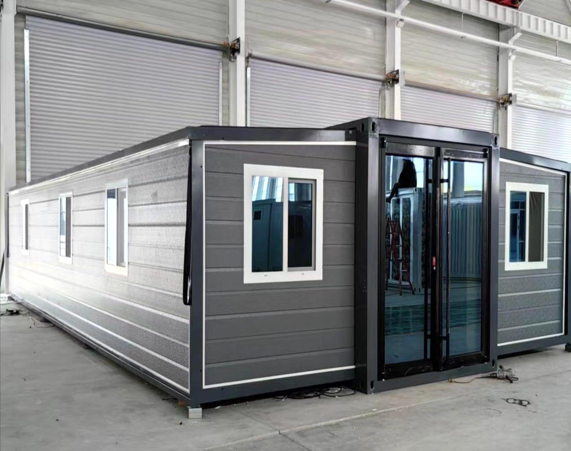 40 ft grey double-wing expandable house in deployed form