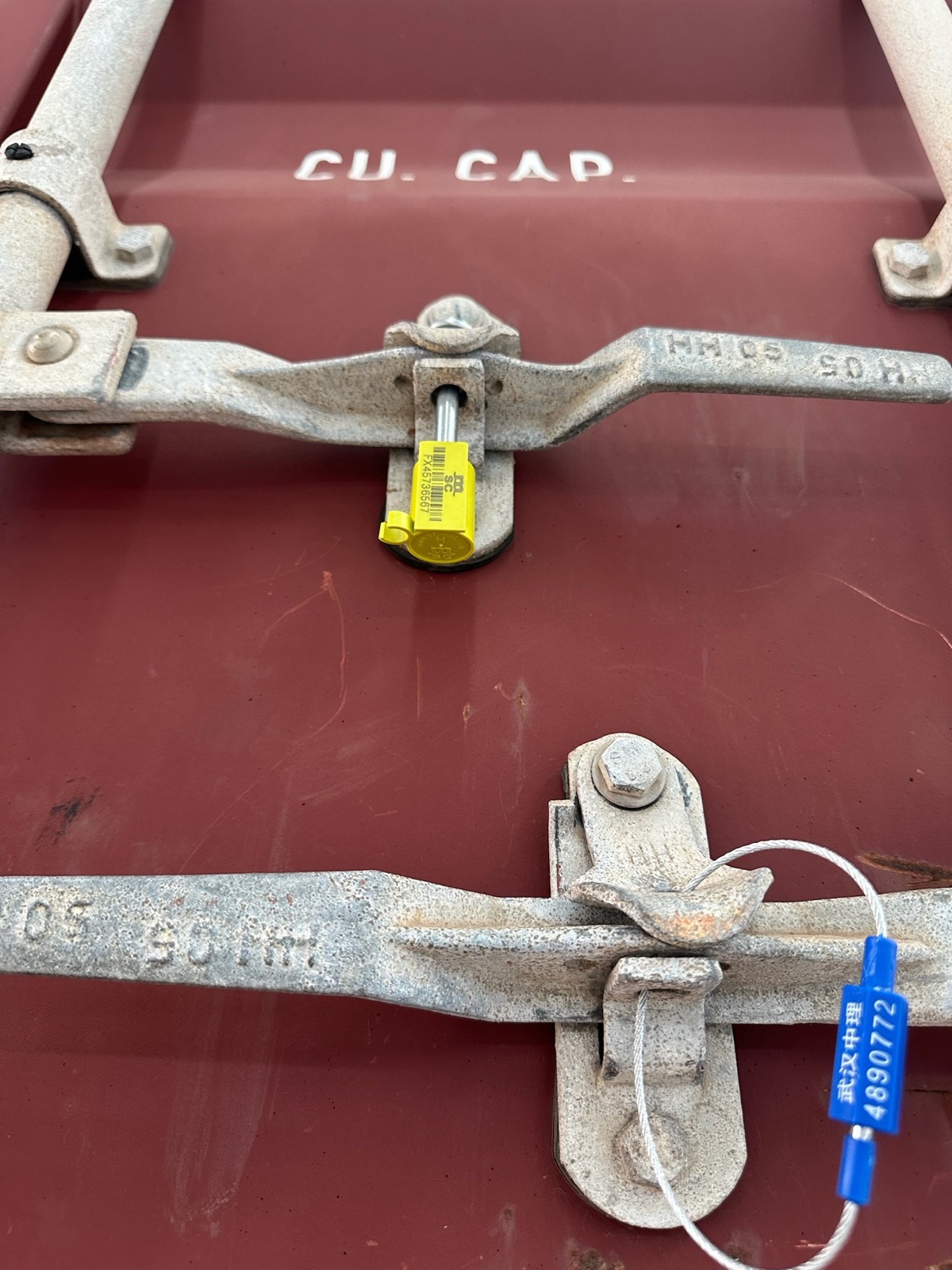 Numbered security seals fitted to a closed export container