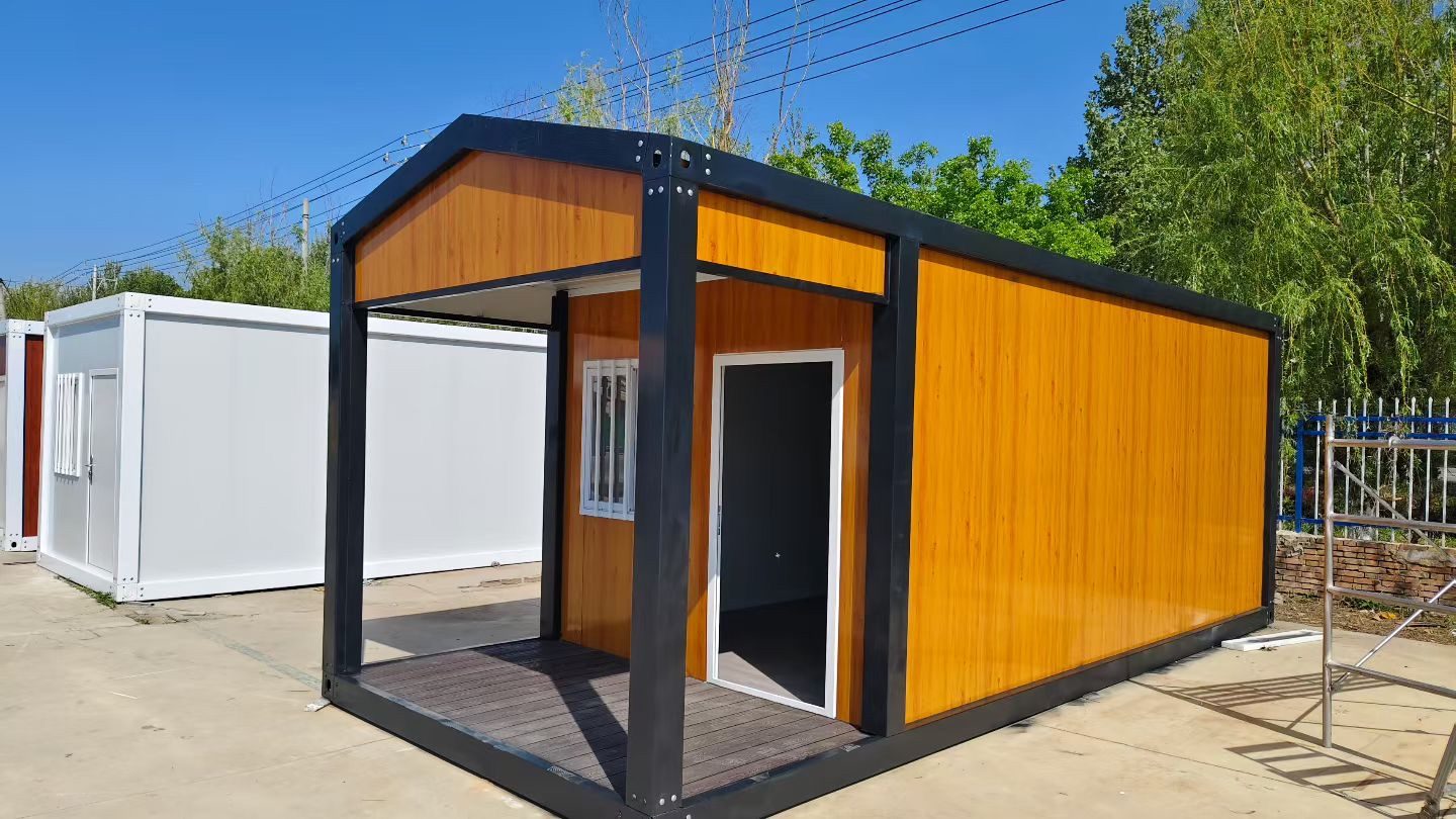 Compact modular house with warm wood-look cladding