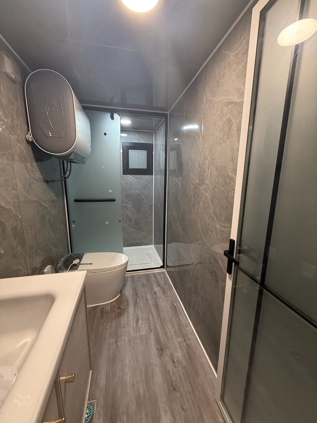 Bathroom layout showing vanity, toilet and shower