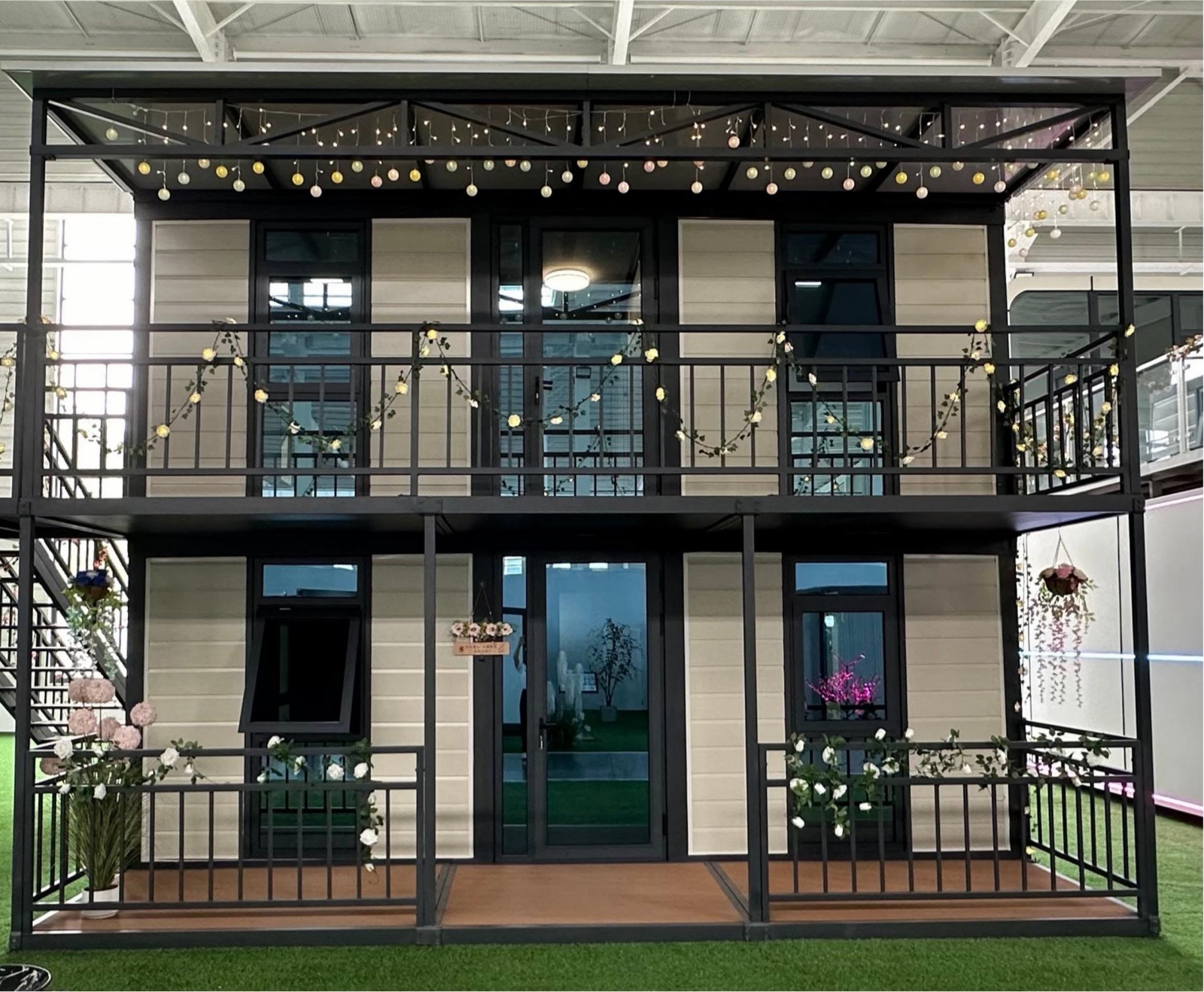 Two-storey modular building with balcony